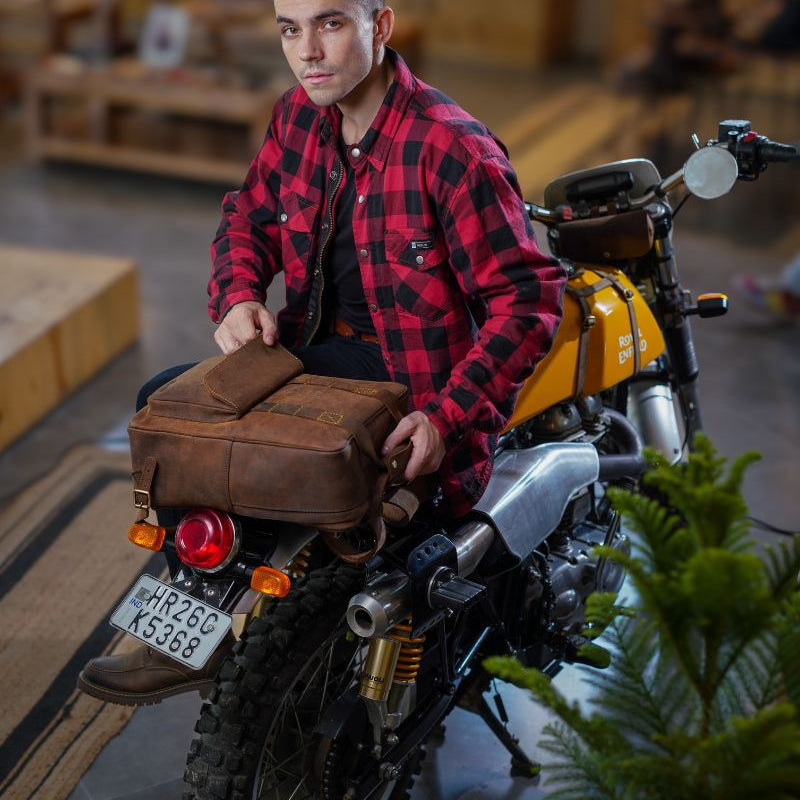Top angle view of handmade genuine leather brown color eastwood backpack mouted as tail bag on bike