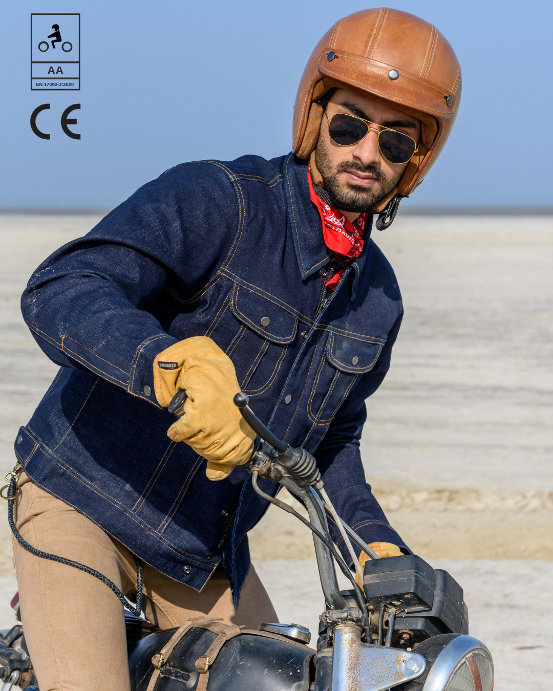 This image features a man riding a motorcycle, wearing a stylish and functional zero: denim riding jacket. The jacket is crafted from high-quality Coolmax Denim, ensuring both comfort and durability.