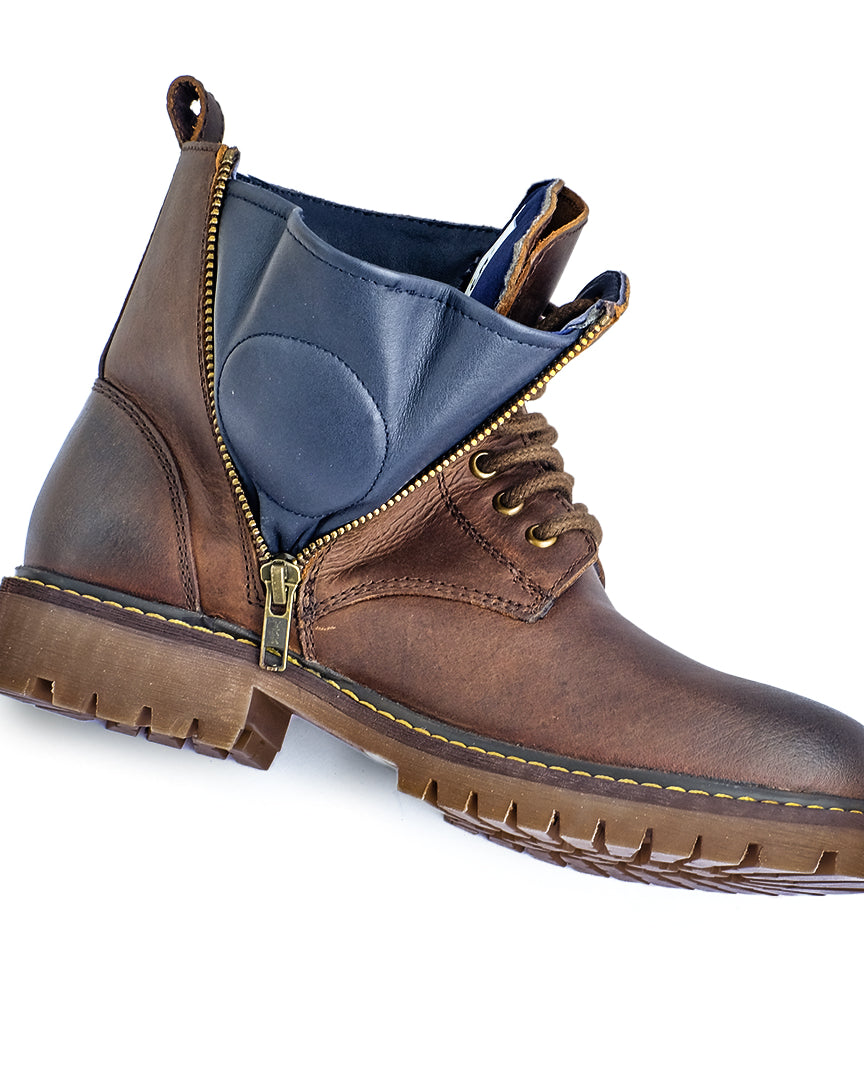 Brown leather boot with a blue inner lining and gold zipper on a white background
