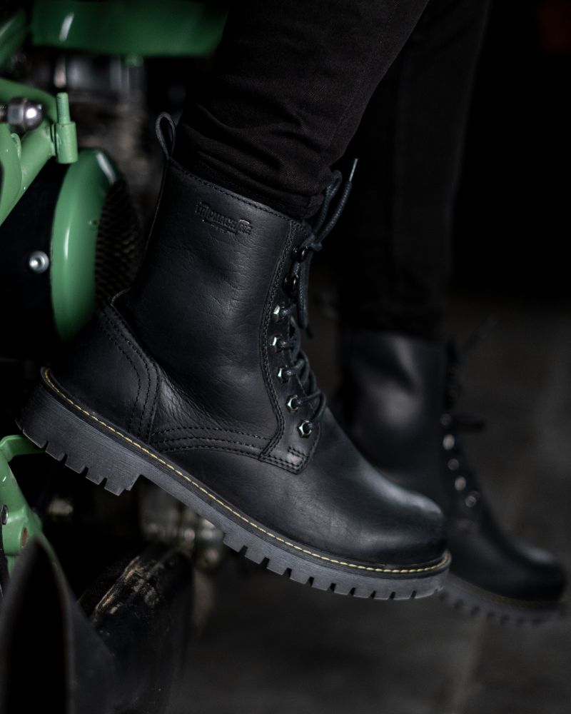 Side view of black color handmade genuine leather derby boots with ankle, toe and heel protector for bikers