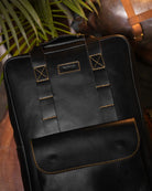 Front view of handmade genuine leather black color eastwood backpack on table