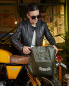 Handmade genuine leather brown color eastwood backpack with rain cover mounted on a bike