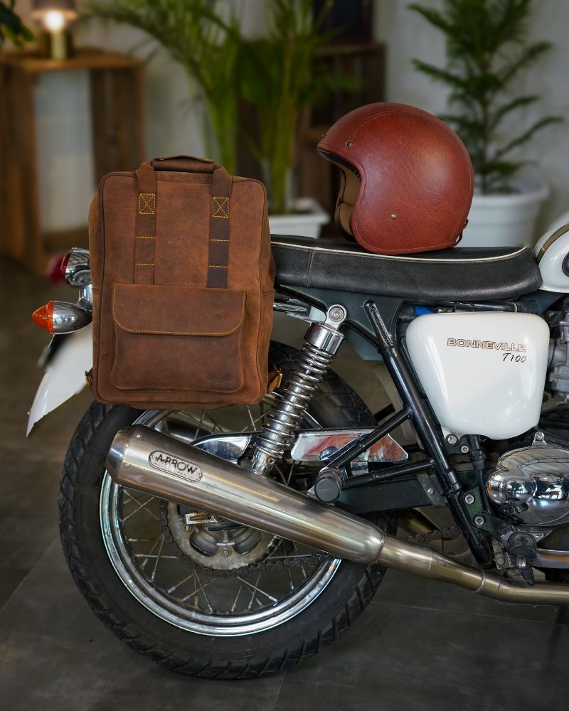 Handmade genuine leather brown color eastwood backpack mounted bike as saddlebag on a bike