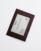 Brown package with a label on a white background