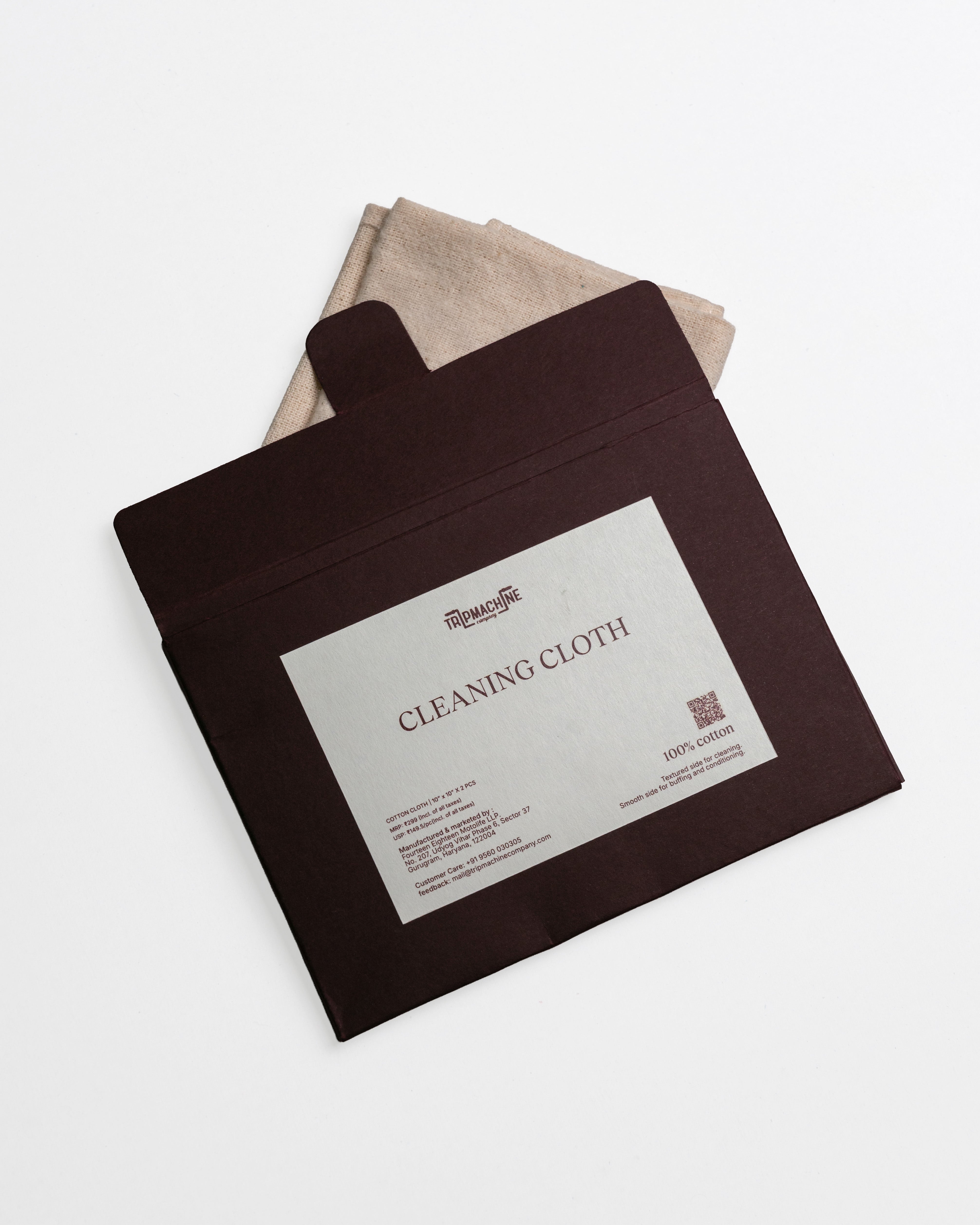 Cleaning cloth with brown pouch and label on a white background