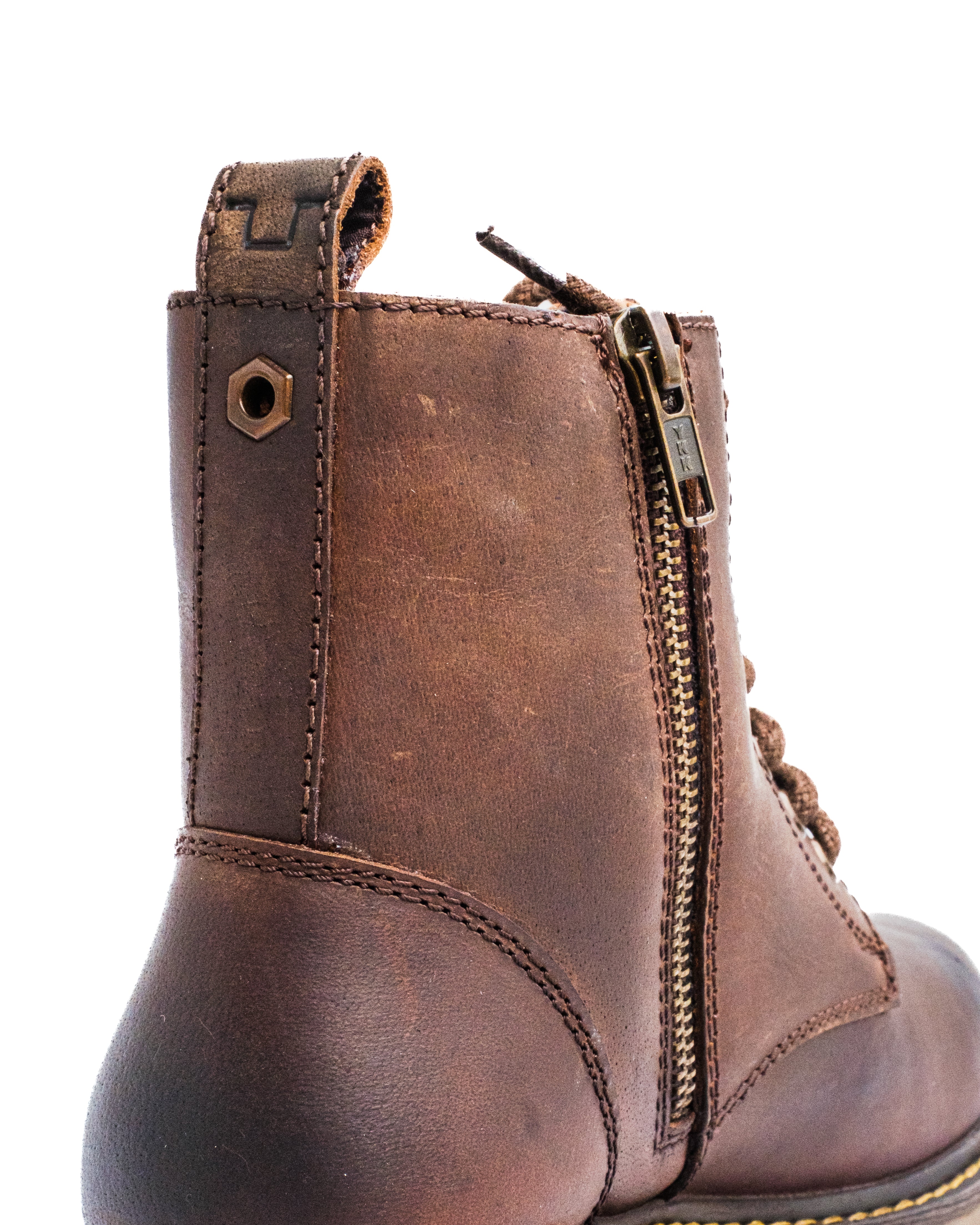 Brown leather boot with a zipper on a white background